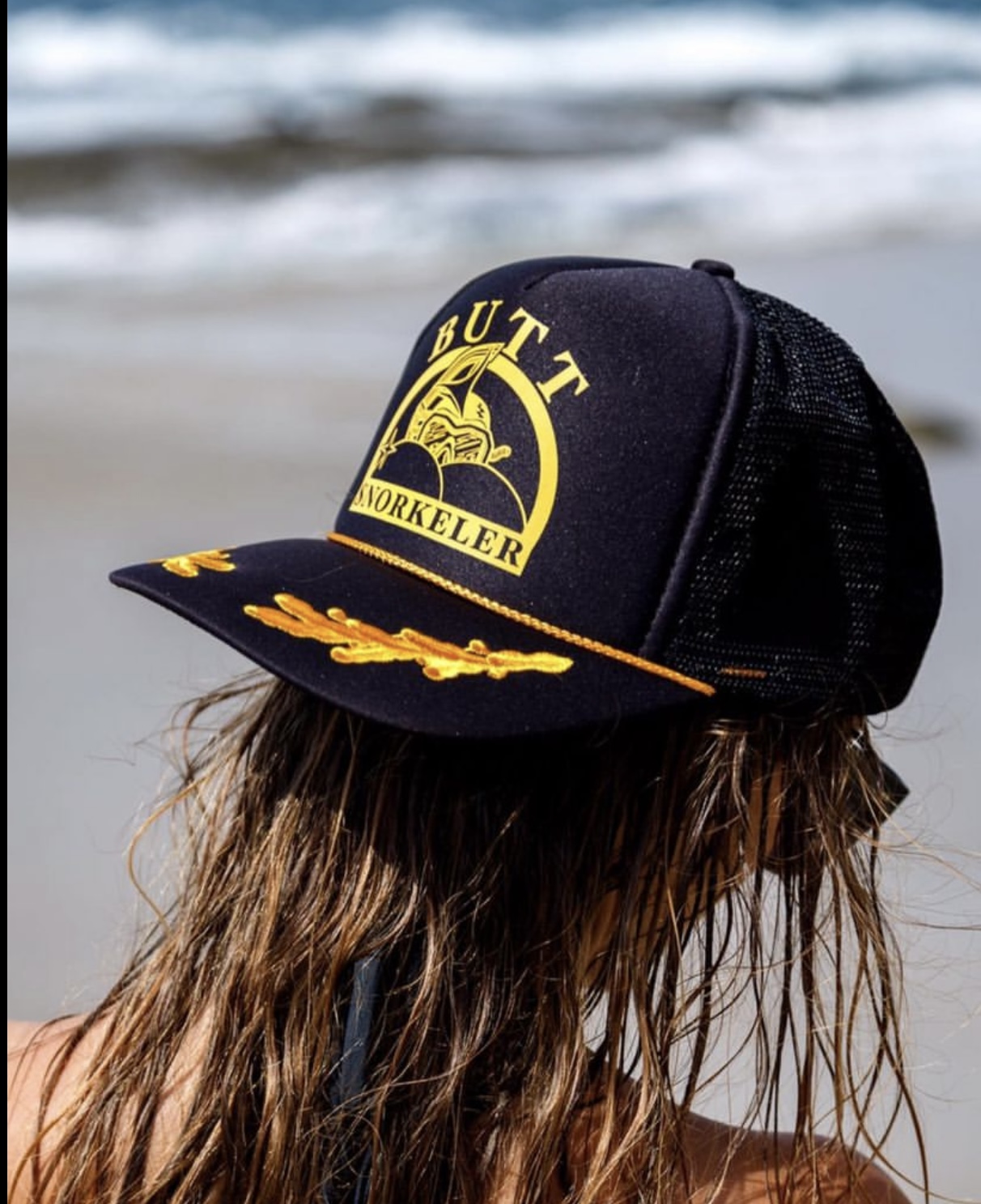 Butt Snorkeler cap lifestyle shot at the beach